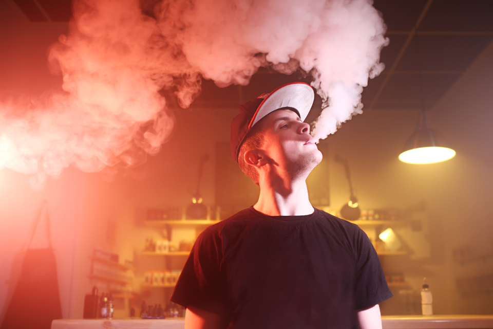 vaping man in a cloud of vapor in a vape bar 2023 11 27 05 27 58 utc 1